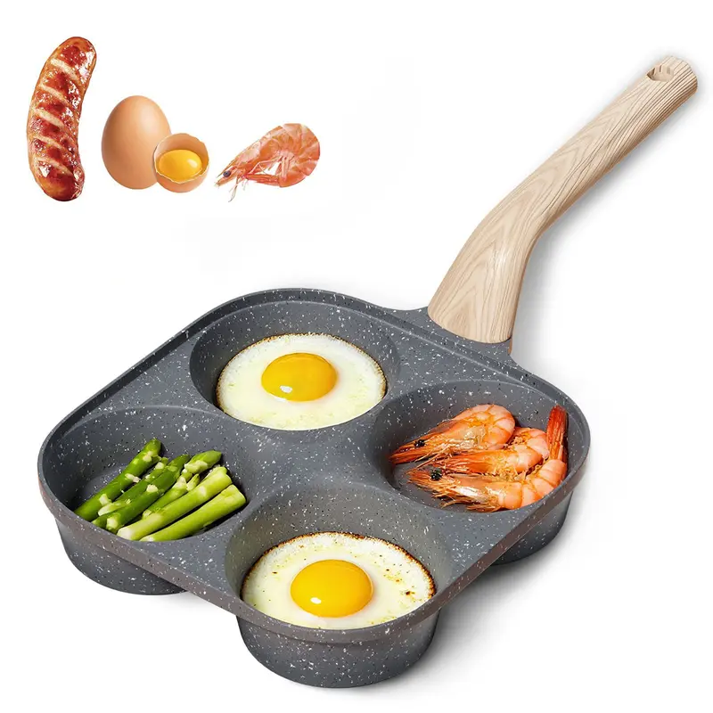 Gray four-section nonstick breakfast pan with a wood-look handle holding eggs, vegetables and shrimp