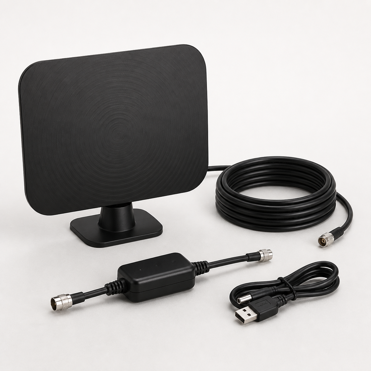 Compact black indoor digital TV antenna with coaxial cable USB power lead and inline amplifier