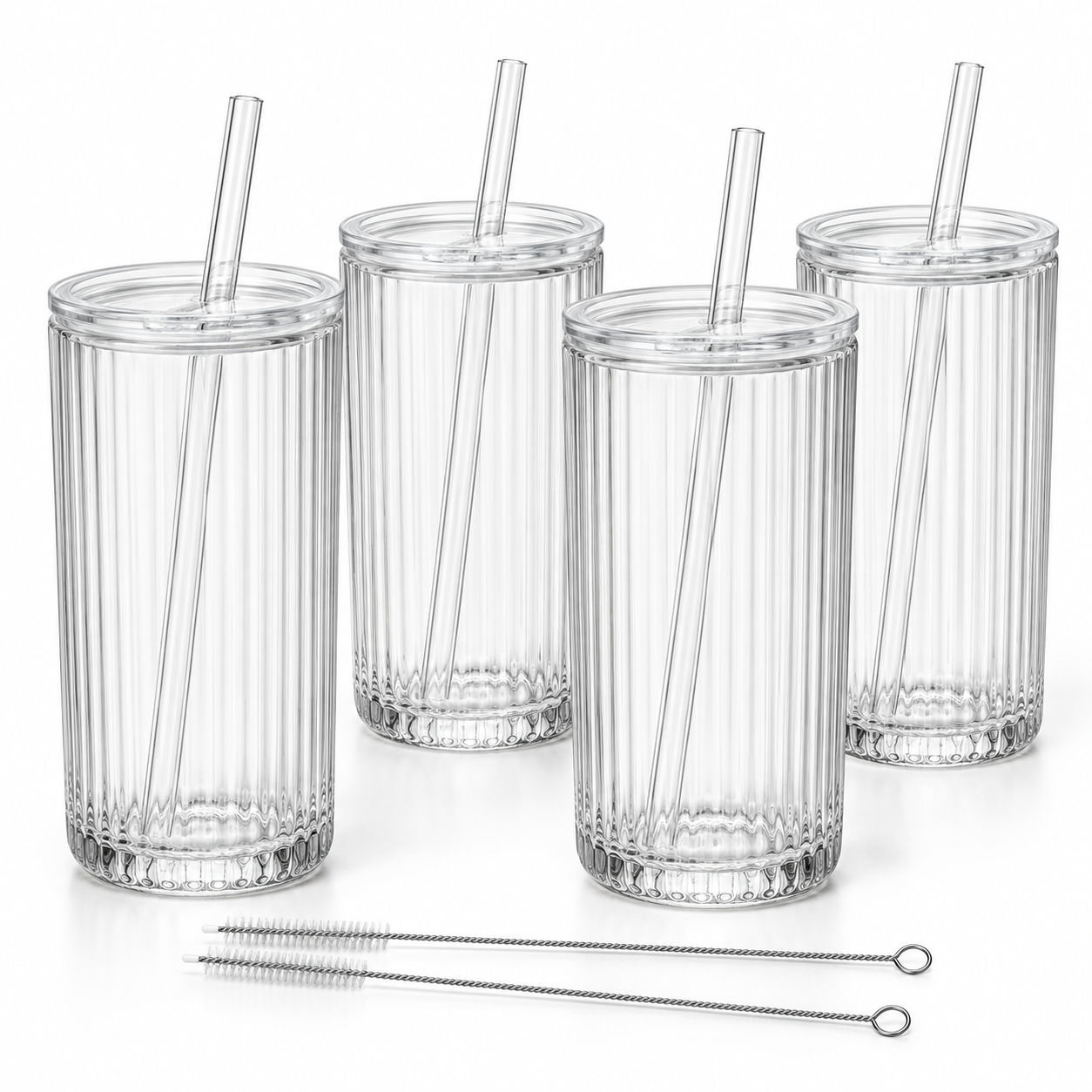 Illustrative four empty ribbed glass tumblers with clear lids and straws beside two cleaning brushes