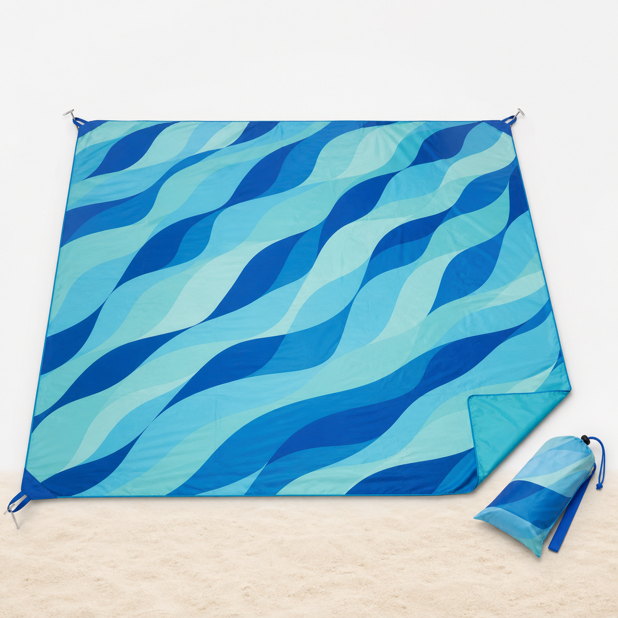 Extra-large blue sand-free waterproof beach blanket with stakes and storage pouch