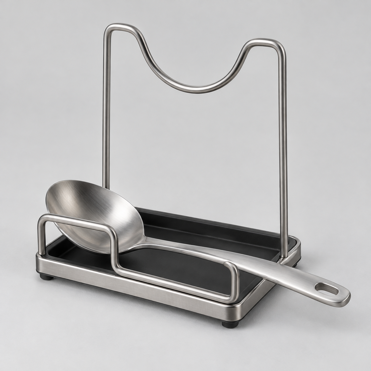 Unbranded stainless steel pot lid and spoon rest with black drip tray